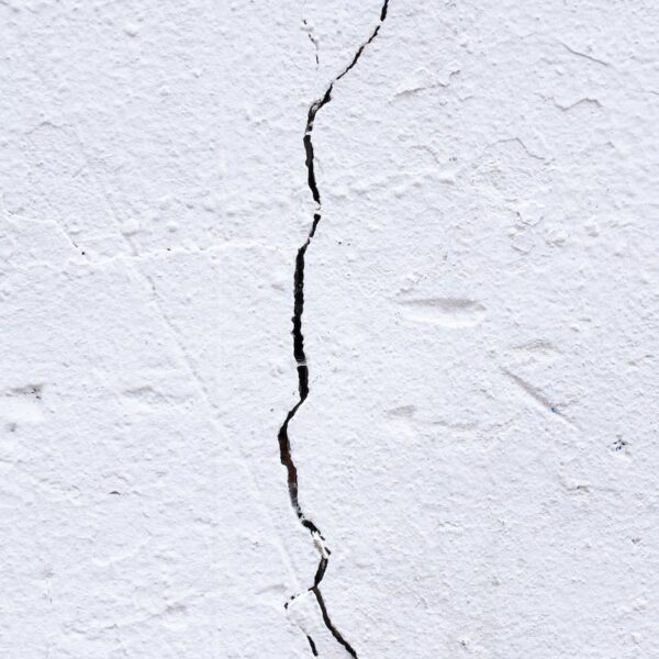 textured surface of old shabby white wall
