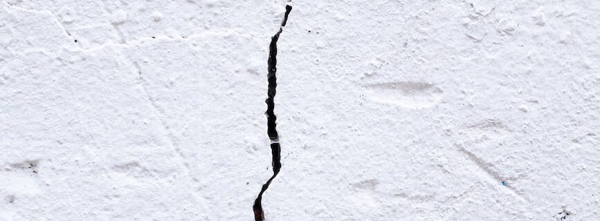 textured surface of old shabby white wall