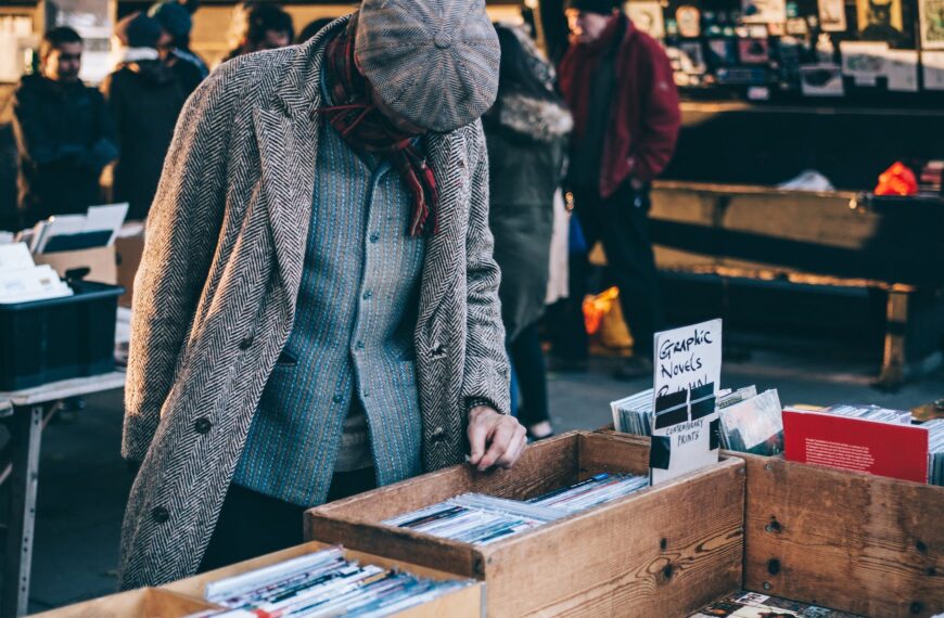 person standing in front of brown crate