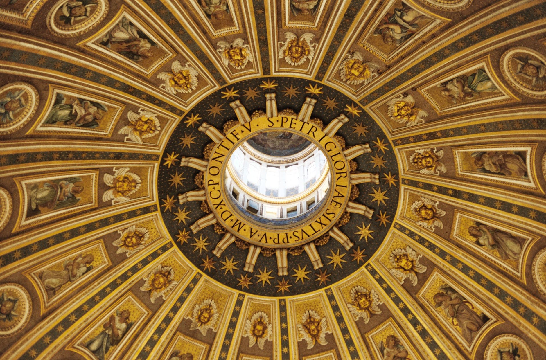 gold interior design on ceiling of st peters basilica